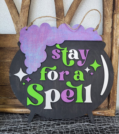 DIY Stay for a Spell Cauldron Door Hanger