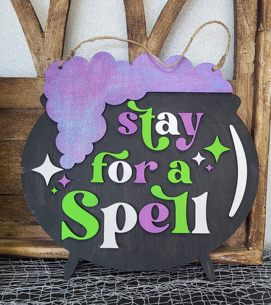 DIY Stay for a Spell Cauldron Door Hanger